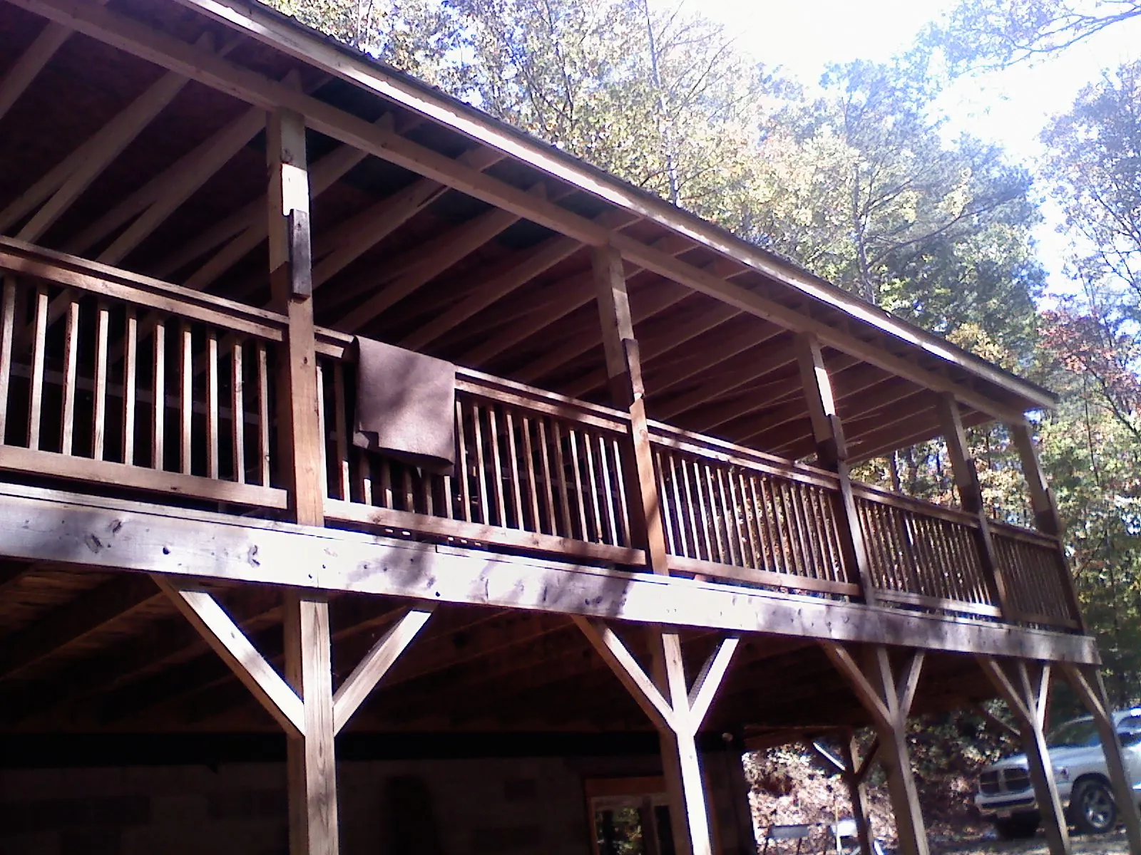 Timber framing under a new elevated porch and deck — Roof Leak Repair in Klemme by Roofing Brothers